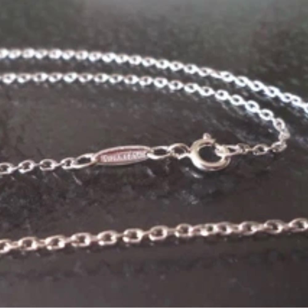 Tiffany & Co. Signed, Sterling Silver
925 Stamped, 16" Length Link Chain.